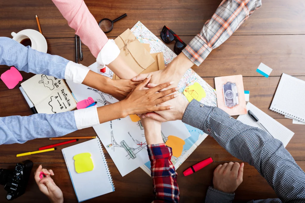 businessmen hands wooden table with documents drafts businessmen hands wooden table with documents drafts