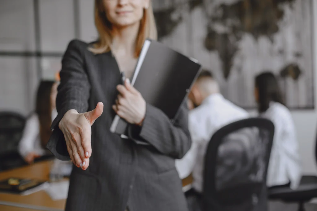 girl signs documents lady sitting table manager working office girl signs documents lady sitting table manager working office