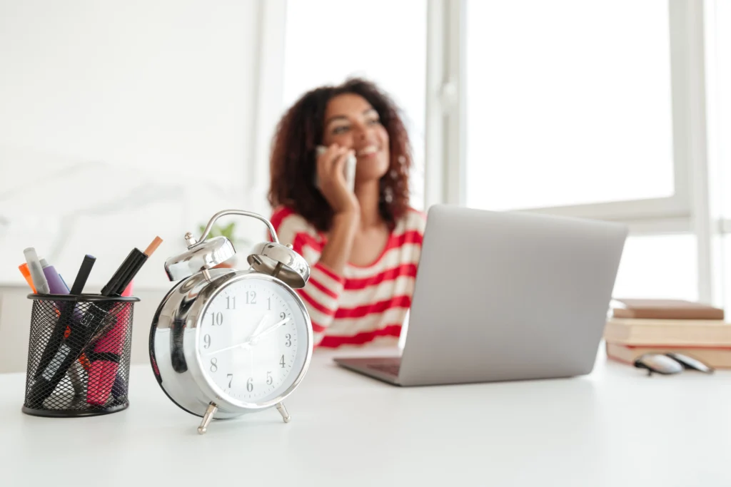 cheerful lady talking smartphone workplace cheerful lady talking smartphone workplace