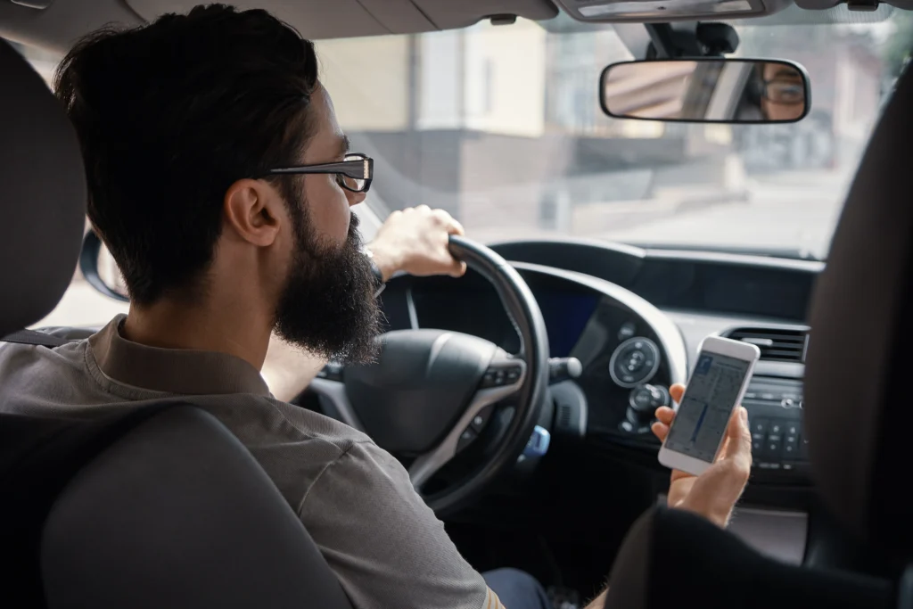 man using mobile phone while driving 1 man using mobile phone while driving 1