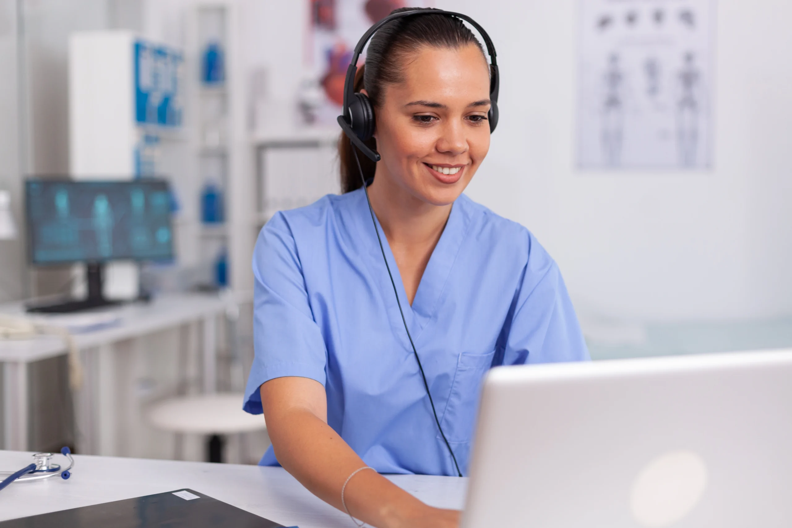 medical staff talking with patient about prescription wearing headset with microphone hospital office health care physician sitting desk using computer modern clinic looking monitor scaled medical staff talking with patient about prescription wearing headset with microphone hospital office health care physician sitting desk using computer modern clinic looking monitor scaled