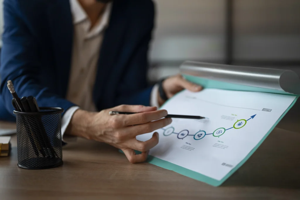 person office analyzing checking finance graphs person office analyzing checking finance graphs