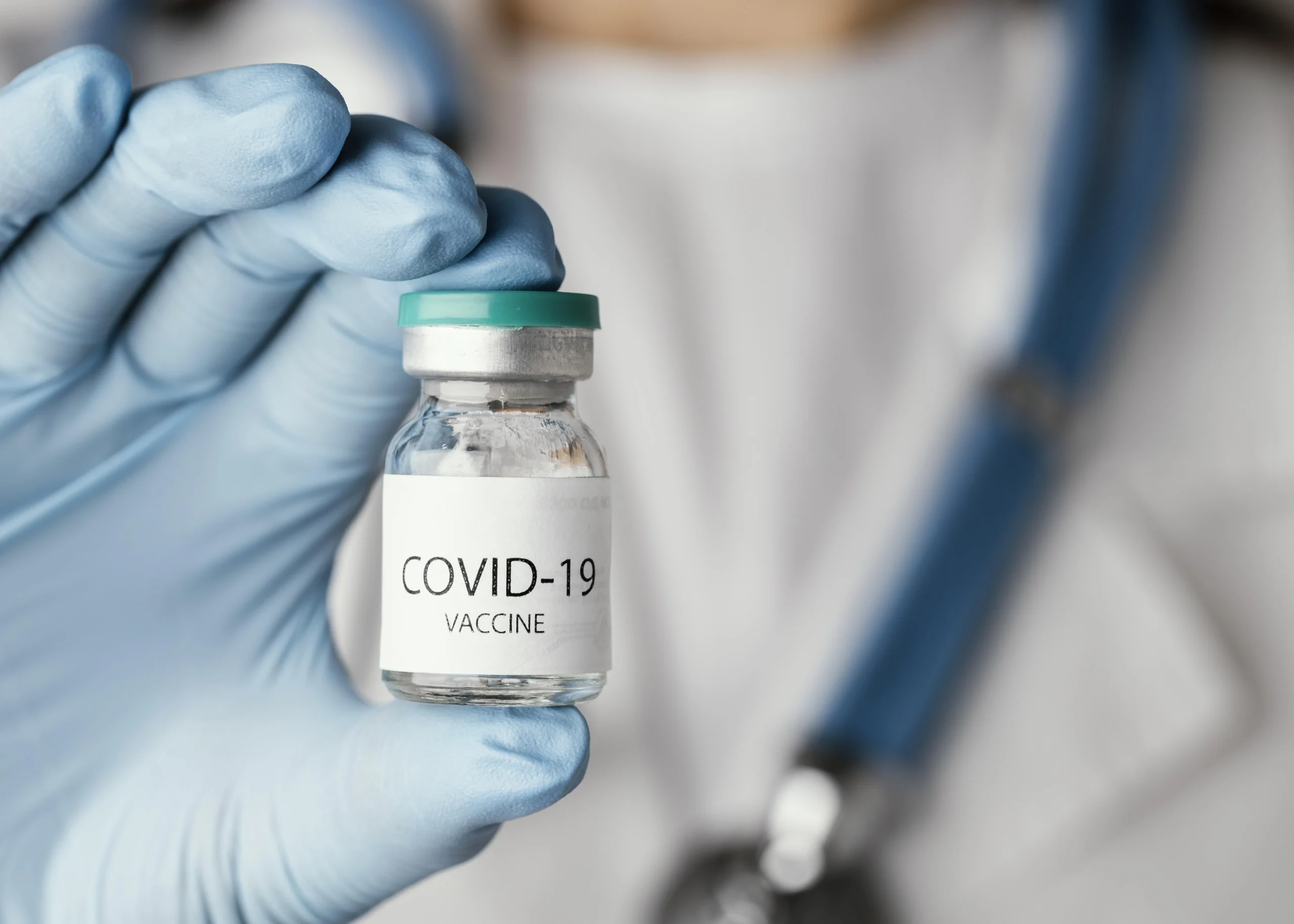 doctor preparing covid 19 vaccine scaled doctor preparing covid 19 vaccine scaled
