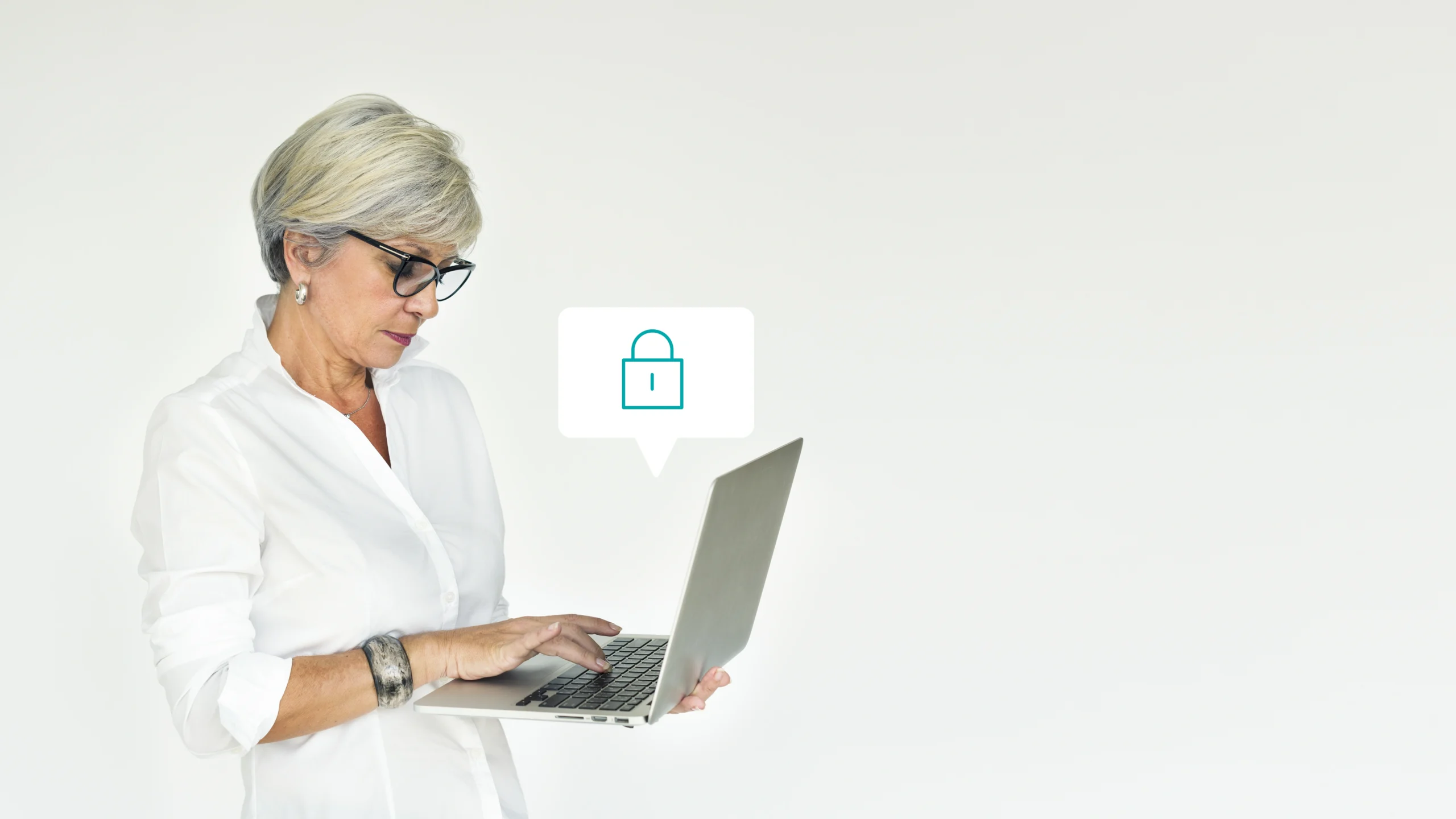 elderly woman using laptop scaled elderly woman using laptop scaled