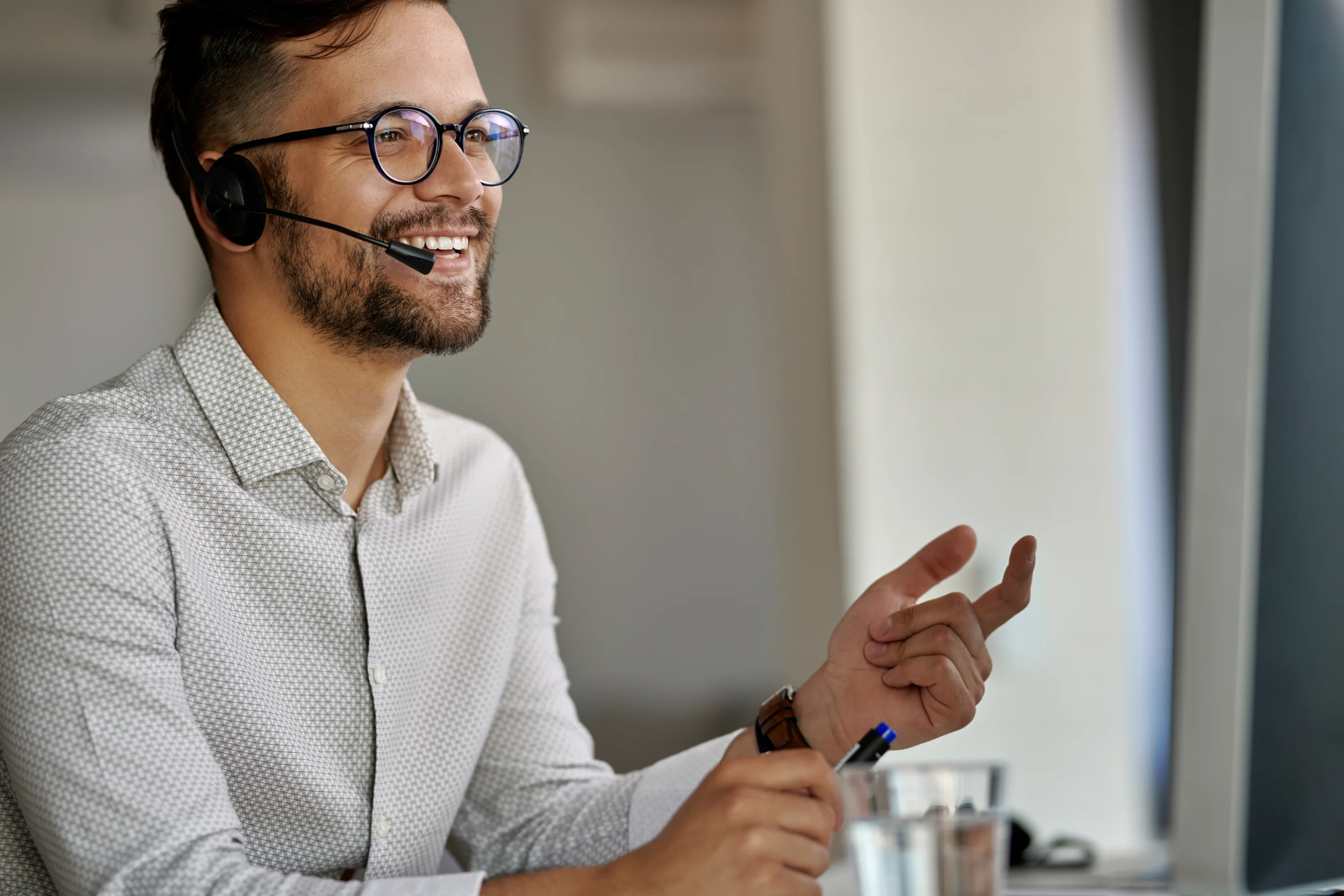 happy call center agent using computer while communicating with clients working office scaled happy call center agent using computer while communicating with clients working office scaled