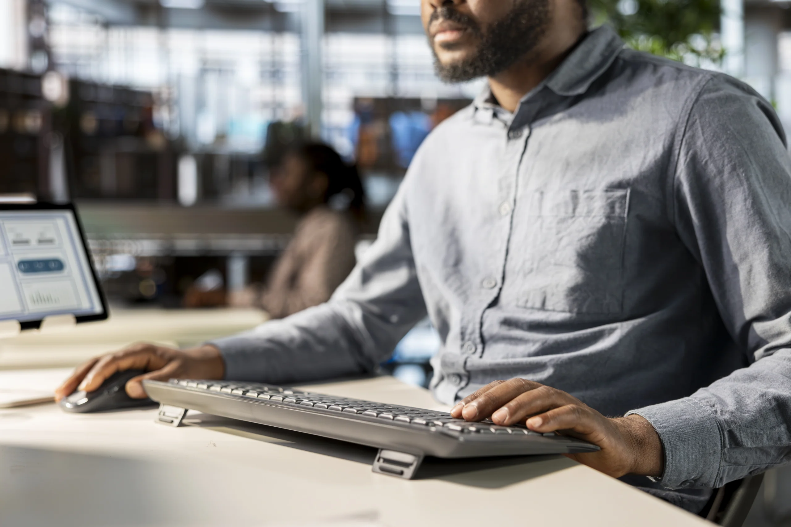 businessman analyzing performance metrics his computer workplace scaled businessman analyzing performance metrics his computer workplace scaled