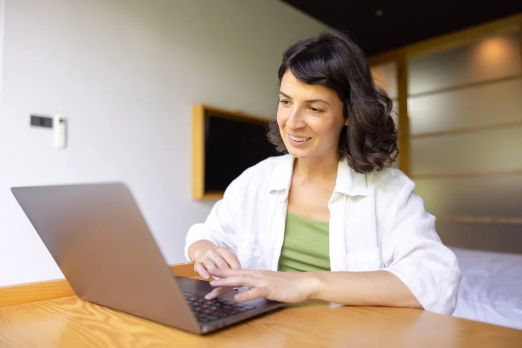 attractive woman sitting home working attractive woman sitting home working