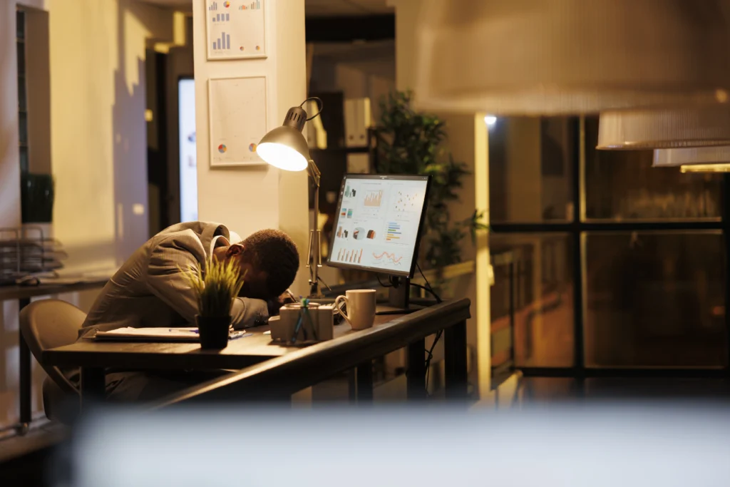 tired drained entrepreneur sleeping desk startup office 1 tired drained entrepreneur sleeping desk startup office 1